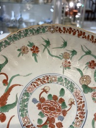A Dutch-decorated Chinese plate, an Imari-verte dish and a blue and white dish, Kangxi/Yongzheng