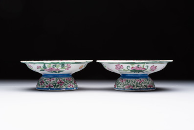 A pair of Chinese famille rose 'mandarin ducks in a lotus pond' Bencharong  tazzas for the Thai market, 19th C.