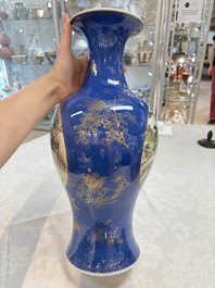 A Chinese famille rose powder-blue-ground vase, 19th C.