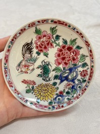 A Chinese famille rose 'roosters' covered teapot and two cups and saucers, Yongzheng