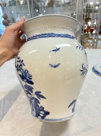 A Chinese blue and white 'birds among flowering branches' vase and cover, 19th C.