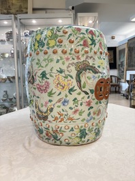 A Chinese famille rose celadon-ground garden seat, 19th C.