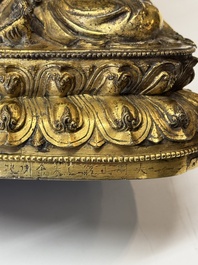 An extremely rare and fine Chinese gilt-bronze Buddha, inscribed 大明正統己未金川比丘昌靜捐資命工造, Zhengtong mark and of the period, dated 1439