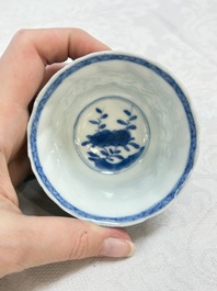 A set of four Chinese blue and white cups and saucers, flower mark, 19th C.