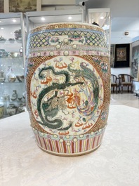 A pair of Chinese famille rose 'dragon and phoenix' garden seats, 19/20th C.