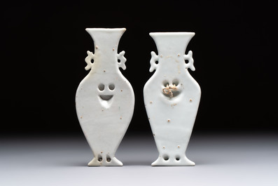 Three Chinese Canton famille verte plates and two famille rose wall pocket vases, 19th C.