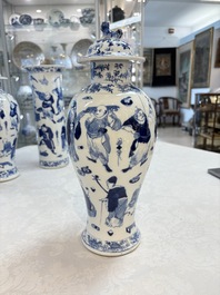 A Chinese blue and white garniture of four vases with figural design, Kangxi mark, 19th C.