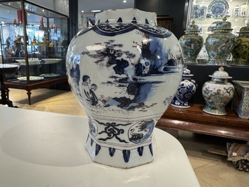 A blue, white and manganese Dutch Delft chinoiserie vase and cover, ca. 1700
