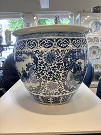 A Chinese blue and white fish bowl with narrative design, 19th C.