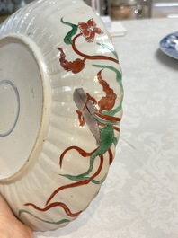 A Dutch-decorated Chinese plate, an Imari-verte dish and a blue and white dish, Kangxi/Yongzheng