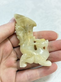 Two Chinese celadon, white and russet jade carvings, 18/19th C.