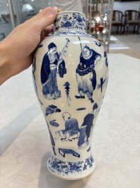 A Chinese blue and white garniture of four vases with figural design, Kangxi mark, 19th C.