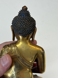 A fine Sino-Tibetan gilt-bronze figure of Buddha Shakyamuni, 17th C.