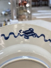A Dutch-decorated Chinese plate, an Imari-verte dish and a blue and white dish, Kangxi/Yongzheng