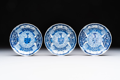 Eight Chinese blue and white cups and saucers, Kangxi mark, 19th C.