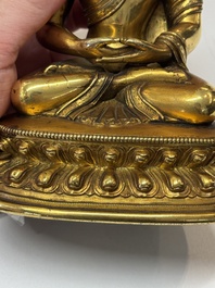 A fine Sino-Tibetan gilt-bronze figure of Buddha Shakyamuni, 17th C.