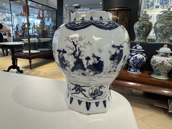 A blue, white and manganese Dutch Delft chinoiserie vase and cover, ca. 1700