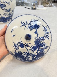 A Chinese blue and white 'birds among flowering branches' vase and cover, 19th C.