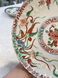 A Dutch-decorated Chinese plate, an Imari-verte dish and a blue and white dish, Kangxi/Yongzheng