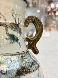 A pair of Chinese famille verte vases with narrative design, 19th C.