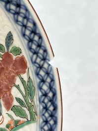 A Dutch-decorated Chinese plate, an Imari-verte dish and a blue and white dish, Kangxi/Yongzheng
