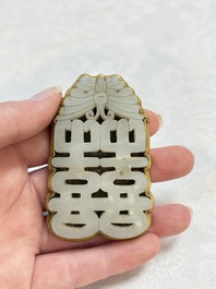 A Chinese gilt bronze-mounted white jade 'double happiness' belt buckle, 18th C.