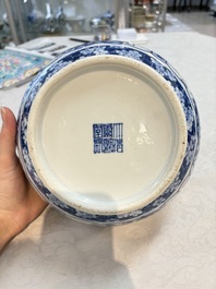 A Chinese blue and white 'birds among flowering branches' vase, Kangxi mark, 19th C.