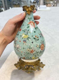A Chinese wucai square covered container, a gilt bronze-mounted famille verte vase and a Canton famille verte bottle vase, Kangxi and later