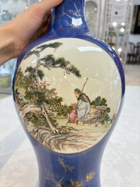 A Chinese famille rose powder-blue-ground vase, 19th C.