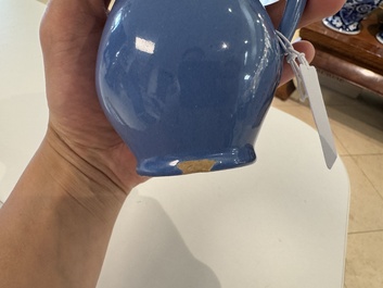 A very rare blue-glazed Dutch Delft jug with a mounted silver cover, 18th C.