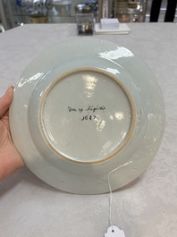A rare Chinese Dutch-decorated 'The miracle of Zaandam' plate and cup, Qianlong