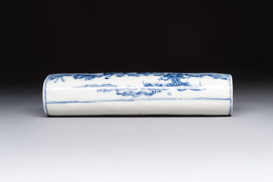 A Chinese blue and white wrist rest with figural design, 19th C.