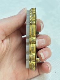 A Chinese gilt bronze-mounted white jade 'double happiness' belt buckle, 18th C.