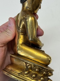 A fine Sino-Tibetan gilt-bronze figure of Buddha Shakyamuni, 17th C.