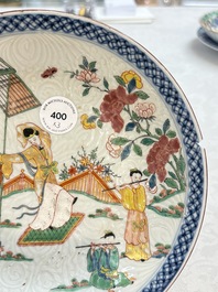 A Dutch-decorated Chinese plate, an Imari-verte dish and a blue and white dish, Kangxi/Yongzheng
