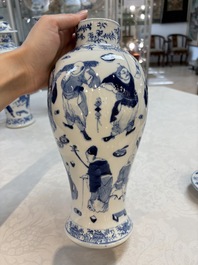 A Chinese blue and white garniture of four vases with figural design, Kangxi mark, 19th C.