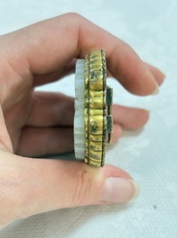 A Chinese gilt bronze-mounted white jade 'double happiness' belt buckle, 18th C.
