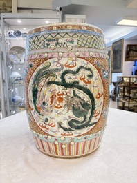 A pair of Chinese famille rose 'dragon and phoenix' garden seats, 19/20th C.