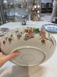 A Dutch-decorated Chinese plate, an Imari-verte dish and a blue and white dish, Kangxi/Yongzheng