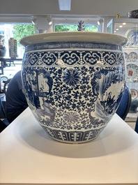 A Chinese blue and white fish bowl with narrative design, 19th C.