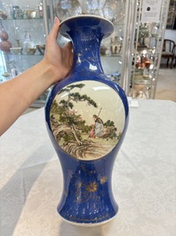 A Chinese famille rose powder-blue-ground vase, 19th C.