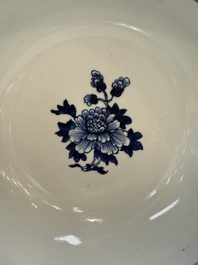 A Chinese blue and white punch bowl with a lady and two boys in a garden, Qianlong