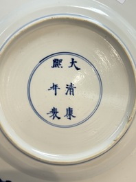 A Dutch-decorated Chinese plate, an Imari-verte dish and a blue and white dish, Kangxi/Yongzheng