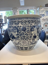 A Chinese blue and white fish bowl with narrative design, 19th C.