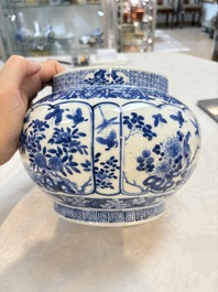 A Chinese blue and white 'birds among flowering branches' vase, Kangxi mark, 19th C.