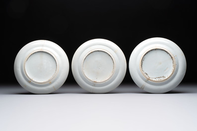 Three Chinese Canton famille verte plates and two famille rose wall pocket vases, 19th C.