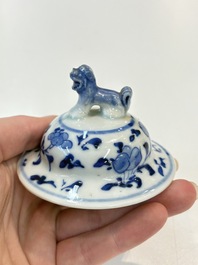 A Chinese blue and white garniture of five vases with landscape design, 19th C.