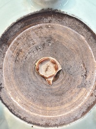 A Chinese celadon-glazed tripod censer with floral anhua design, 18/19th C.
