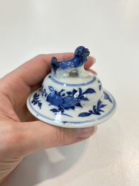 A Chinese blue and white garniture of five vases with landscape design, 19th C.