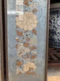 A fine Chinese kesi square 'dragon' panel and two silk embroideries with floral design, 19th C.